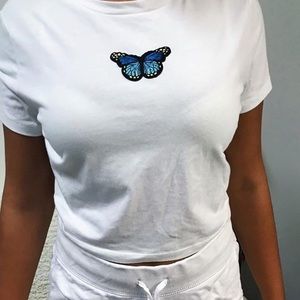 White cropped tee with butterfly patch